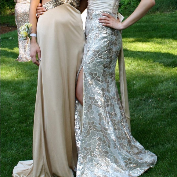 The gold dress on the left. Gorgeous silk - Picture 2 of 2